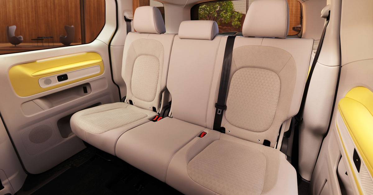 An image of the interior of the new 2022 Volkswagen ID. Buzz interior showing the rear passenger seats