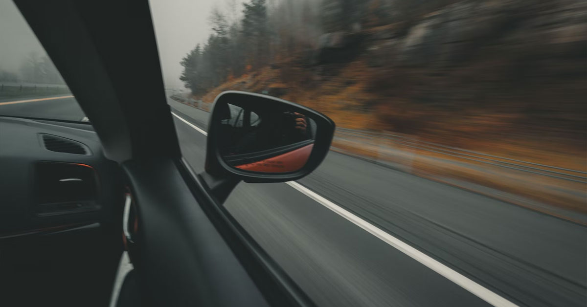 An image of a left hand drive car during motion