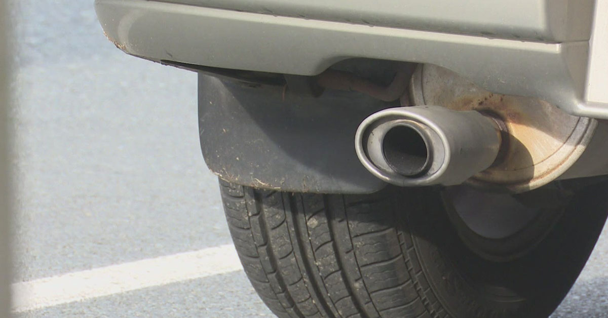 An image of an exhaust and catalytic converter visible from the back of a car