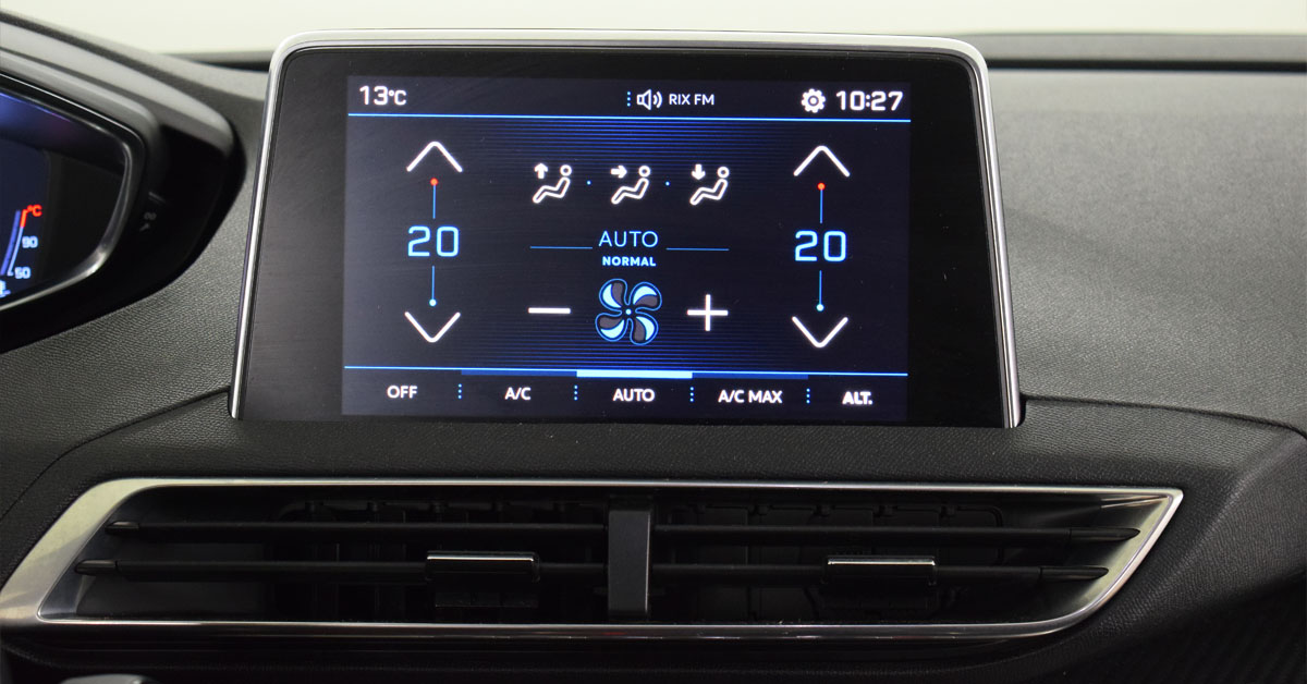 An image showing a car's air conditioning system switched on