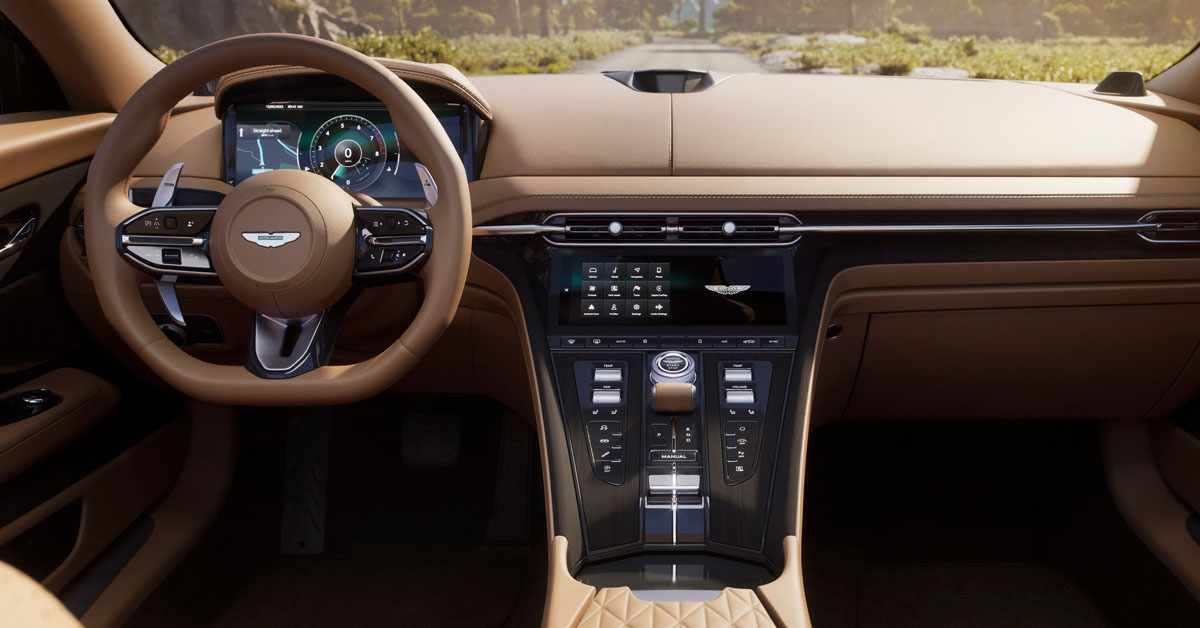 An new image of the 2023 Aston Martin Volante open-top super tourer showing the interior dashboard area, showing the infotainment system and steering wheel