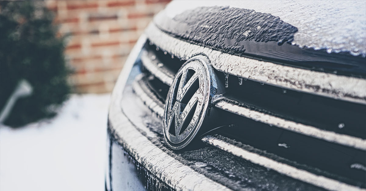 A Volkswagen vehicle frozen after an icy night outside