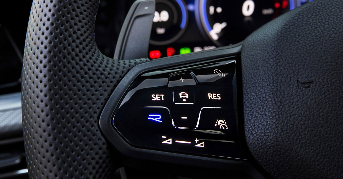 A picture of the 2021 Volkswagen Golf R Mk8 steering wheel R button